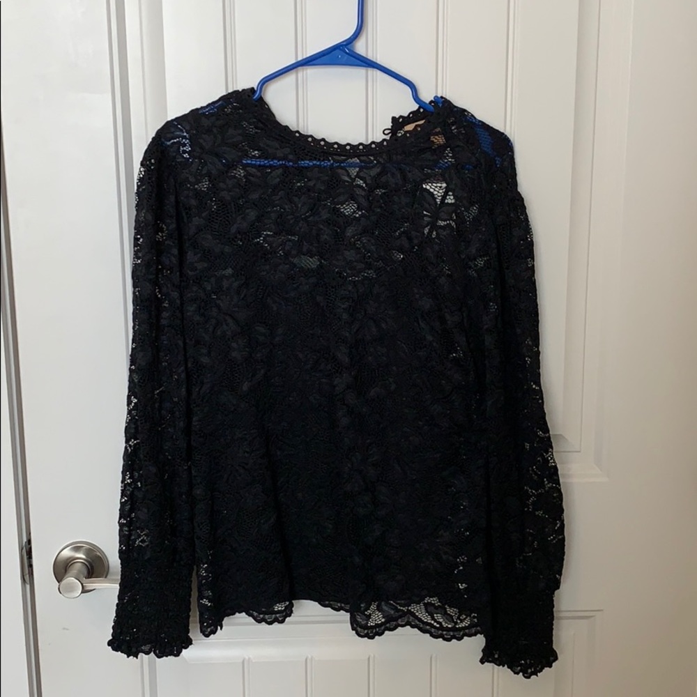 Black colored lace blouse with lining